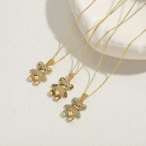Teddy bear pendant necklace set with cubic zirconia and 14K gold plating for women