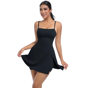 Detail of black tennis dress with side slit and built-in safety shorts for athletic wear