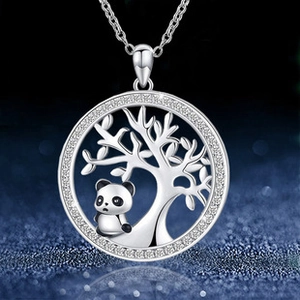Macro detail of silver tree of life necklace featuring a panda with sparkling rhinestones