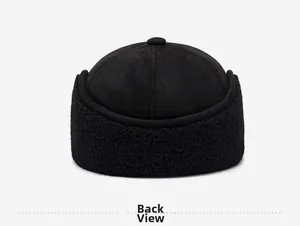 Back view of a winter thermal trapper hat in black with plush lining and matte finish