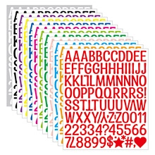 Close-up of assorted colorful alphabet and number stickers for DIY water bottle decor