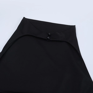 Close-up of the black high-neck collar featuring elegant double round button closures