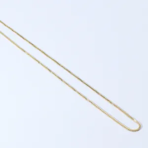 Minimalist gold-plated stainless steel box chain necklace with smooth polished finish