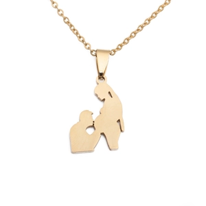 Close-up of golden stainless steel necklace showing man kissing pregnant belly pendant