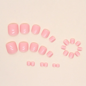 Glossy light pink press-on toenails set in various sizes for a fresh summer pedicure