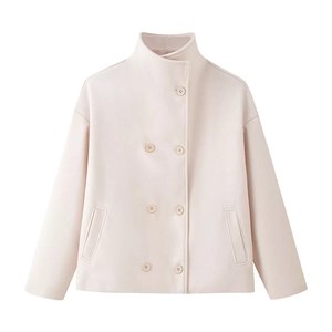 Detail of short double-breasted wool coat in pale pink featuring a stand collar and pockets