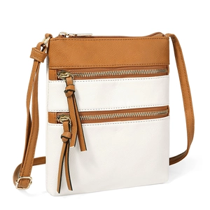Brown and white faux leather crossbody bag with three zipper pockets and pebble texture