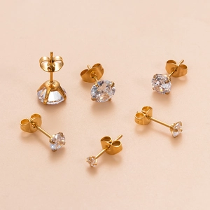 Classic stainless steel stud earrings set with white round zircons in various sizes