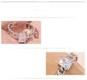 Detail of adjustable hollow chain ring featuring a large rectangular white zircon stone