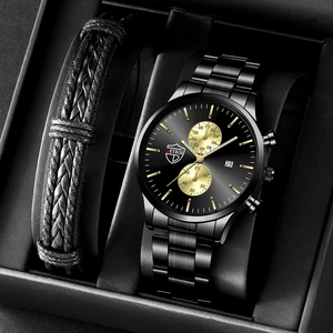 Detail of men's watch set with black metal band, luminous dial and braided leather bracelet