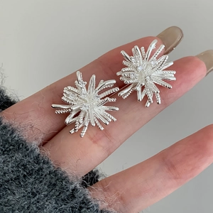 Elegant silver snowflake stud earrings featuring sparkling zircon stones for women