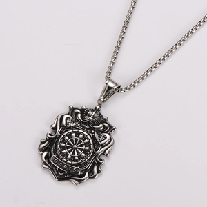 Detailed view of stainless steel shield pendant with dartboard motif and Darts engraving