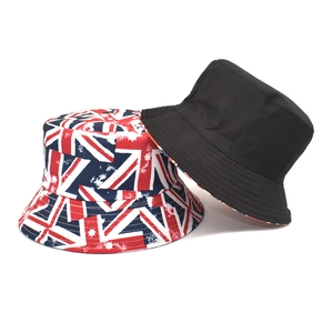 Reversible bucket hat with Union Jack flag print and minimalist solid black cotton fabric