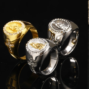Macro shot of retro men's titanium steel cross rings with portrait and inlaid zircons
