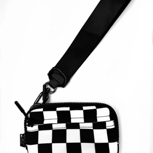 Detail of checkered transparent PVC pouch with wide black wrist strap and metal clip