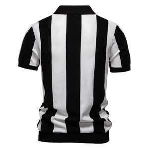 Macro detail of men's knitted polo shirt featuring vertical black and white stripe texture