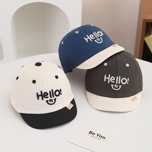 Three children baseball caps with Hello smiley face embroidery in various colors