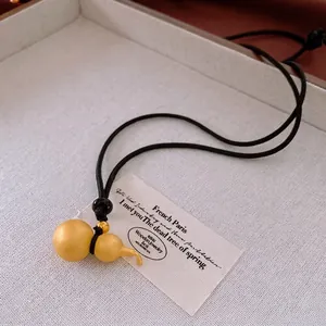New Chinese style adjustable leather rope necklace with a matte gold gourd pendant