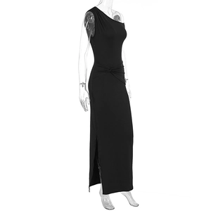 Detail of waist knot decoration and side slit on elegant black one-shoulder maxi dress