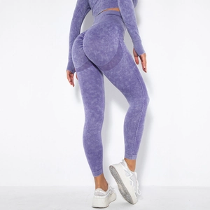 Detail of purple acid wash seamless yoga leggings featuring high waist and scrunch butt effect