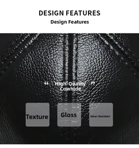 Macro shot of high-quality black cowhide leather with natural litchi texture and gloss