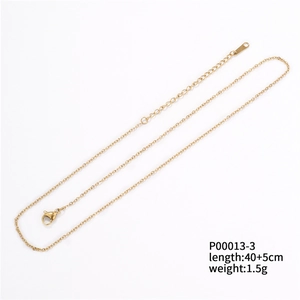 Golden O-chain necklace detail with lobster clasp, extender chain and length tags