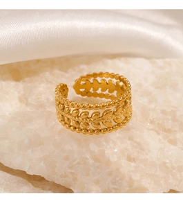 Detailed macro shot of an 18K gold-plated adjustable triple-layer ring with wheat ear patterns