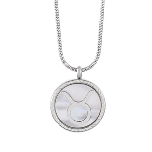 Silver Taurus zodiac necklace with white shell pendant on a snake bone chain