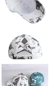 Detail of cross elastic ponytail hole and tie-dye cotton fabric on baseball caps