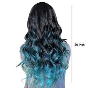 Detail of 20 inch wavy hair extensions with black to teal blue ombre gradient effect