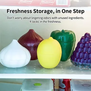 Set of fruit-shaped plastic food storage containers for onion garlic and lemon in a fridge