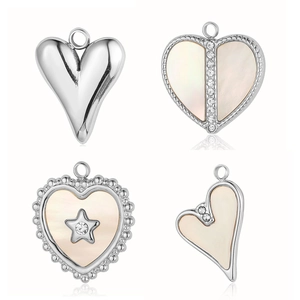 French vintage stainless steel heart pendants with shell inlay and sparkly rhinestones