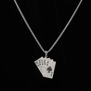 Macro shot of silver hip-hop poker pendant necklace with sparkling 10 J Q K A crystals