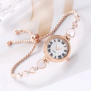 Elegant rose gold heart-shaped bracelet watch with crystals and mother-of-pearl dial