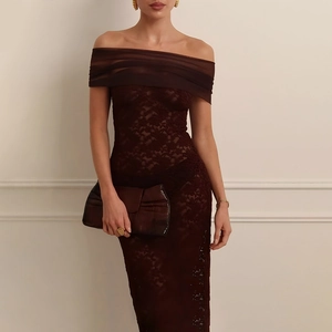 Detail of off-shoulder lace maxi dress featuring sheer texture and pleated chiffon