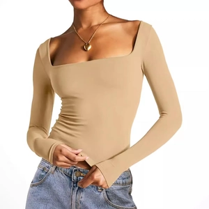 Slim fit camel square neck long sleeve crop top for women paired with blue jeans