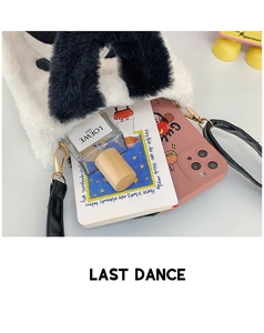 Top view of panda plush crossbody bag interior capacity with daily essentials