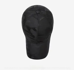Top view of black camo baseball cap showing breathable quick-dry mesh fabric and panels