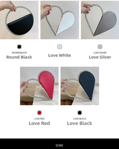 Detail of rhinestone handle evening bags in heart and round shapes for women