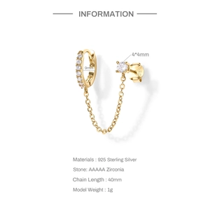 Macro detail of S925 silver earring chain with 14K gold plating and cubic zirconia studs