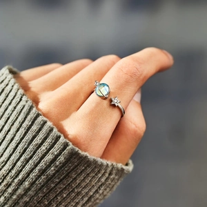 S925 sterling silver celestial ring with iridescent moonstone and sparkling star charm