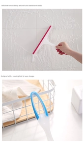 Detail of soft rubber squeegee for glass and tiles featuring ergonomic handle and hanging hole