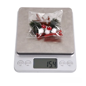 Close-up of Christmas reindeer antler hair clips with pine cones and mushrooms weighing 15.4g