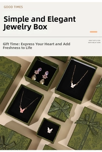 Retro dark green jewelry gift boxes with floral embossing and elegant silk ribbons