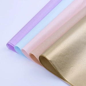 Five assorted colors of tissue paper for floral gift wrapping in a smooth diagonal layout
