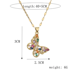 Detail showing colorful rhinestones butterfly pendant with size and weight markers