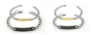 Detail of couple bracelets with laser engraved I Love You text and heart patterns