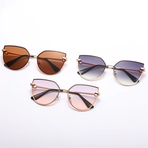 Trendy oversized cat-eye sunglasses with gradient lenses and lightweight metal frames
