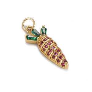 Detailed view of a gold carrot pendant with pink and green zircon gemstones