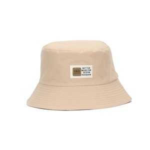 Beige cotton bucket hat for women with a stylish branded patch for sun protection